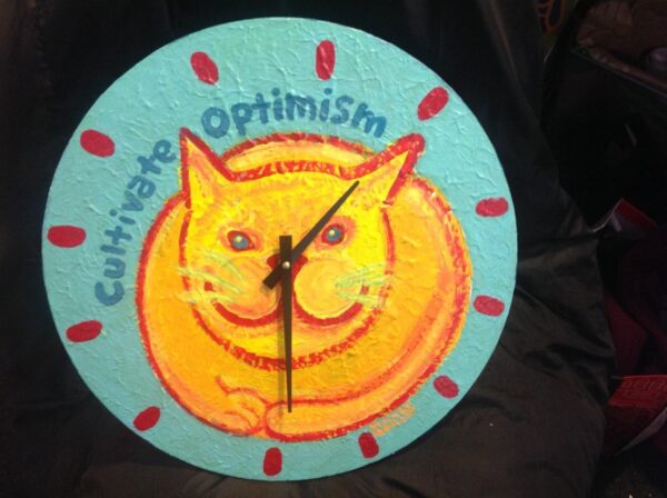Product Image: Yellow cat clock Cultivate Optimism copyright Hillary Vermont