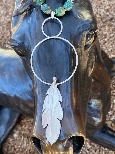 Product Image: Turquoise Sterling Circle Feather Necklace