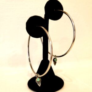 Product Image: “Infinite Arrow Hoop Earrings” by Shasta Brooks
