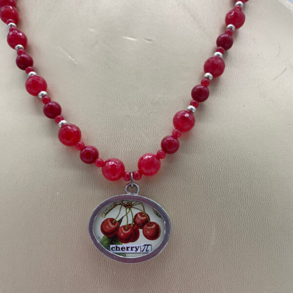 Product Image: Necklace: Red Dyed Faceted Quartz Beads, Reversible Cherries/PI Pendant One of a Kind
