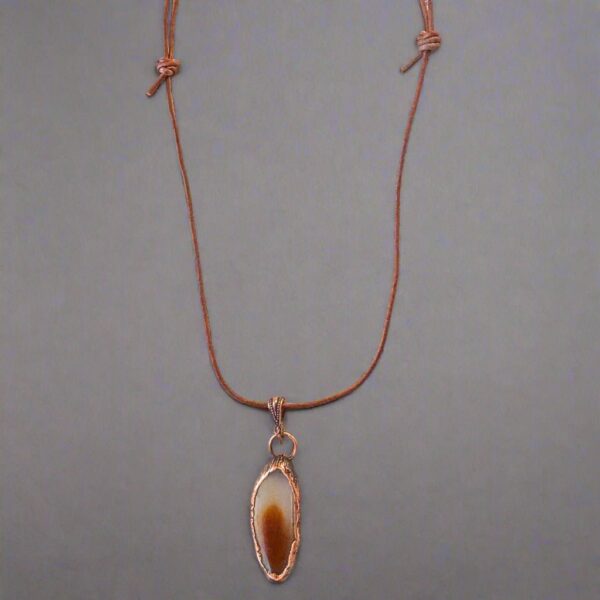 Product Image: Red Agate Slice Necklace | Copper & Leather