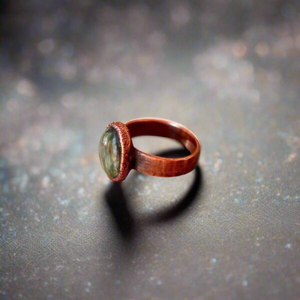 Product Image: Handcrafted Seraphinite Copper Ring for Spiritual Balance
