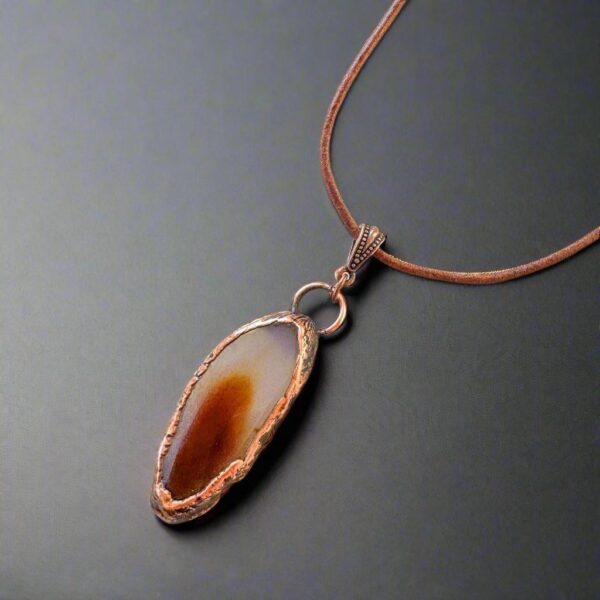 Product Image: Red Agate Slice Pendant Necklace in Copper & Leather