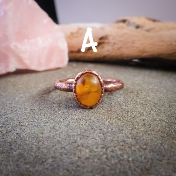 Product Image: Genuine Oval Amber Manifestation Ring in Copper for Positivity