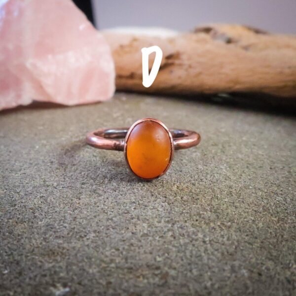 Product Image: Genuine Oval Amber Manifestation Ring in Copper for Positivity