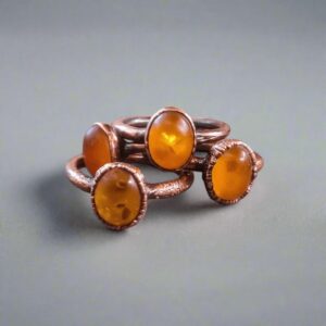 Product Image: Genuine Oval Amber Manifestation Ring in Copper for Positivity