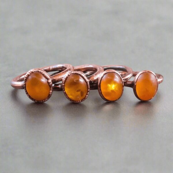 Product Image: Genuine Oval Amber Manifestation Ring in Copper for Positivity