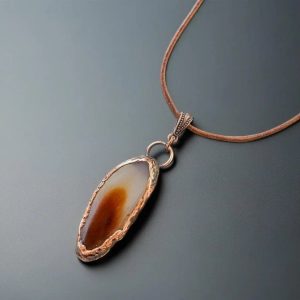 Product Image: Red Agate Pendant Handcrafted Copper Talisman Jewelry Grounded Confidence