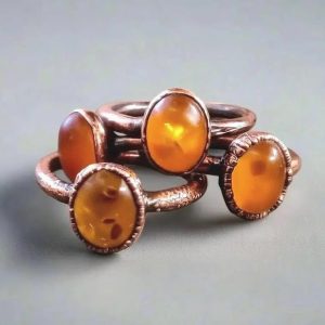 Product Image: Amber Ring – Handcrafted Copper Talisman For Warmth and Confidence