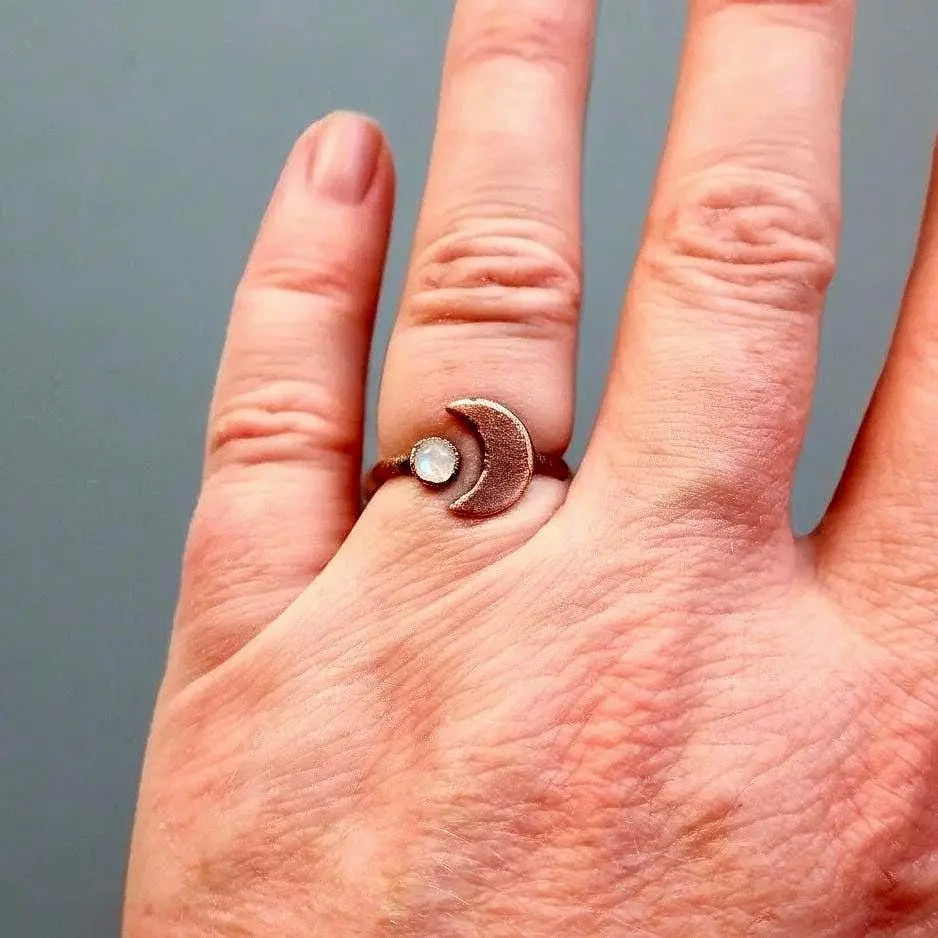 Santa Fe Marketplace Crescent Moon Moonstone Ring — Handcrafted Copper Talisman for Intuition & Lunar Magic Product Image: Crescent Moon Moonstone Ring — Handcrafted Copper Talisman for Intuition & Lunar Magic