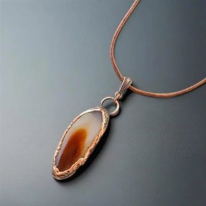 Product Image: Red Agate Pendant Handcrafted Copper Talisman Jewelry Grounded Confidence