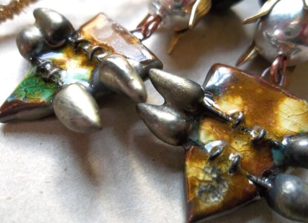 Product Image: Lamp Worked Glass and Ceramic Shield Earrings