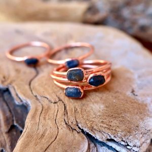 Product Image: Raw Sapphire Ring – Handcrafted Copper Talisman for Clarity