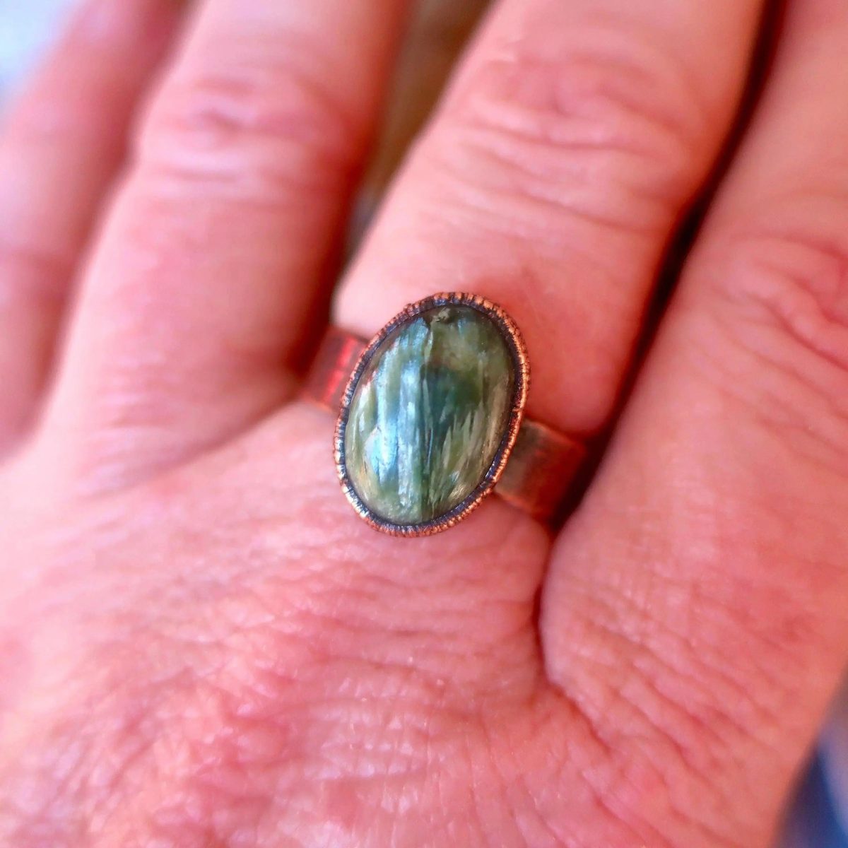 Santa Fe Marketplace Seraphinite Ring — Handcrafted Copper and Crystal Jewelry for Serenity Product Image: Seraphinite Ring — Handcrafted Copper and Crystal Jewelry for Serenity